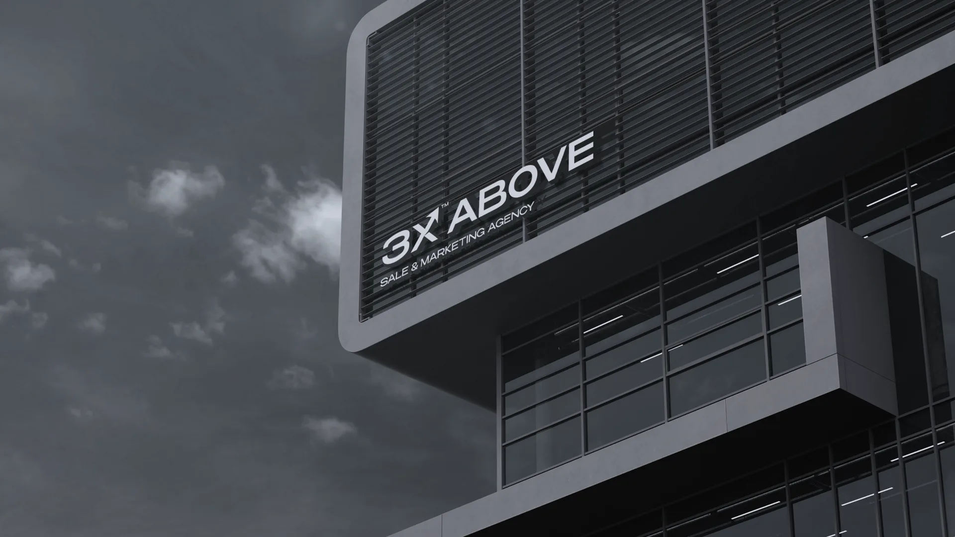 3X Above sale and marketing agency signage on a dark office building against storm clouds