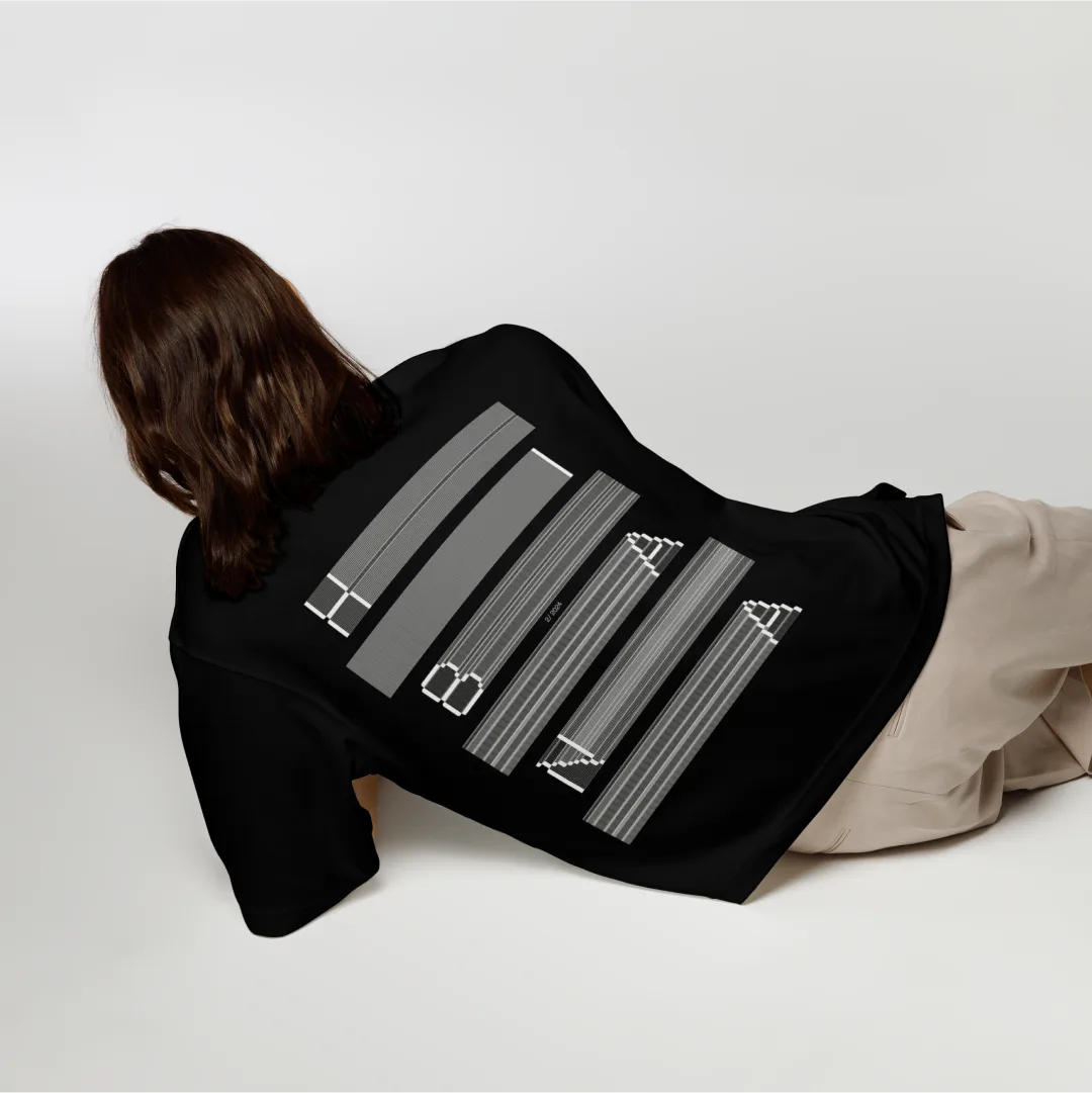 The back of a black tee with the Hibana wordmark stretched into scan lines